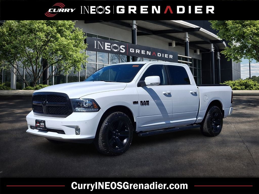 2018 RAM 1500 Night in Bright White Clearcoat — front three-quarter view