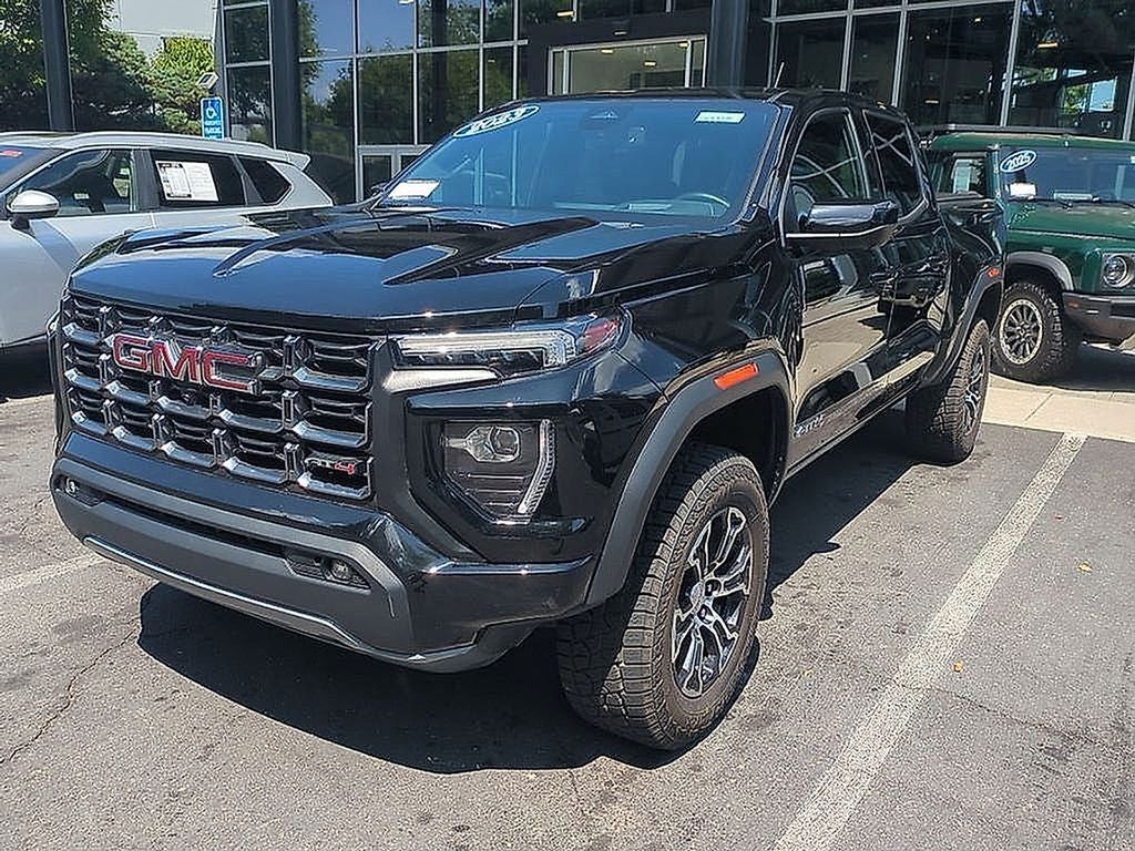 2023 GMC Canyon AT4 in Onyx Black — front three-quarter view
