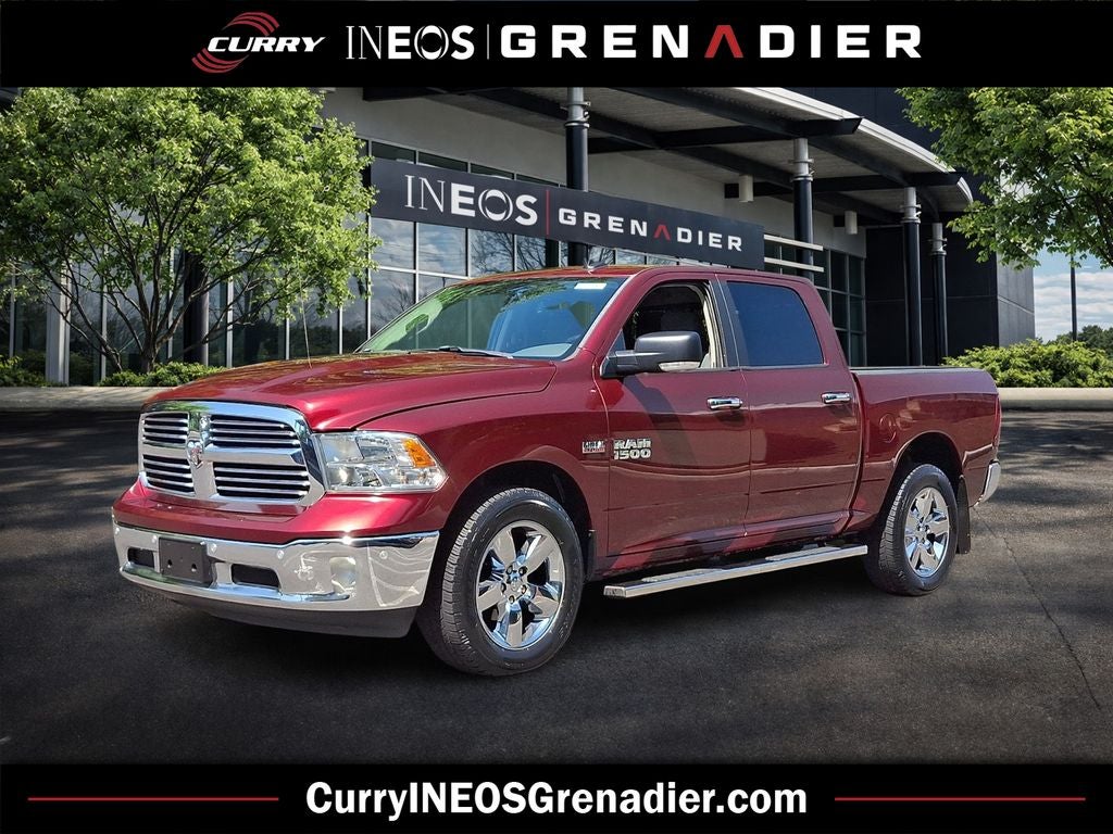 2017 RAM 1500 Big Horn in Delmonico Red Pearlcoat — front three-quarter view