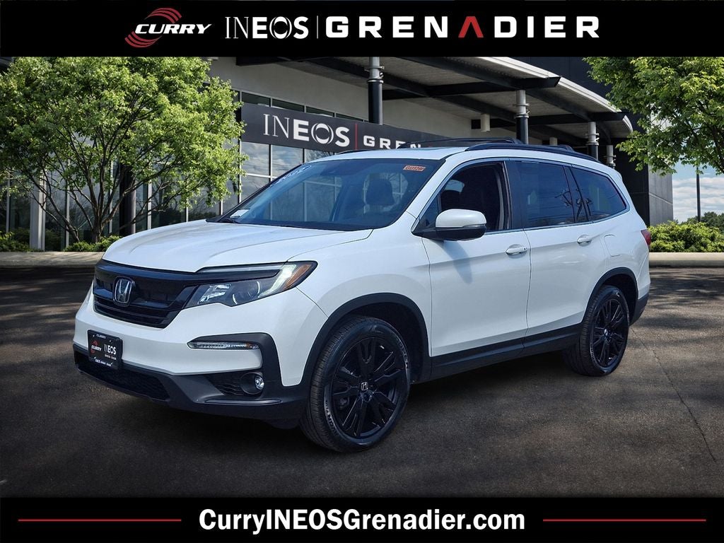 2022 Honda Pilot Special Edition in White — front three-quarter view