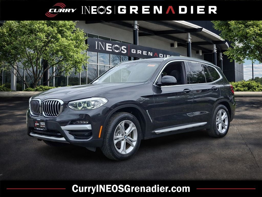 2020 BMW X3 xDrive30i in Dark Graphite Metallic — front three-quarter view