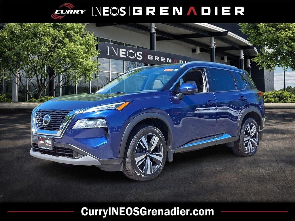 2021 Nissan Rogue SL in Caspian Blue Metallic — front three-quarter view